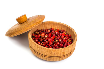 Spicy Spice Pink pepper peas on white background