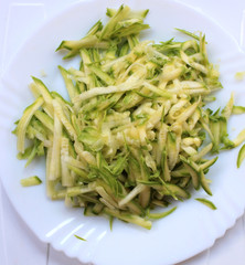 
Zucchini fresh grated salad on a plate