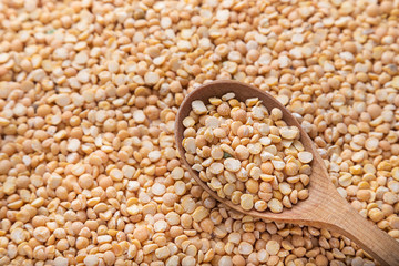 yellow peas in a spoon