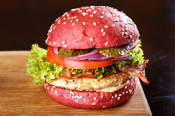 Red burger on the board