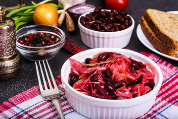 Salad of raw vegetables, red beans, bread