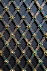 magnificent wrought-iron gates, ornamental forging, forged elements close-up