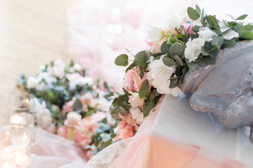 Flowers. Decoration of wedding table in ivory colors