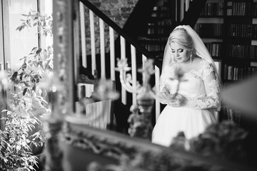 young bride portrait with perfume is getting ready at home in the morning, wedding day