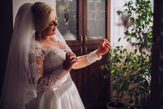 Young Bride Portrait With Perfume Is Getting Ready At Home In The Morning, Wedding Day