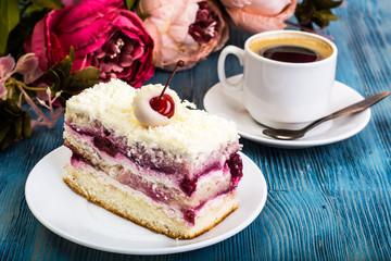 Piece of cake, sponge cakes, cream, cherries, whipped cream on b
