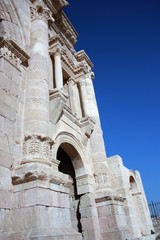 Fototapeta na wymiar Side view of triumphal arch in Jerash, Jordan Middle East