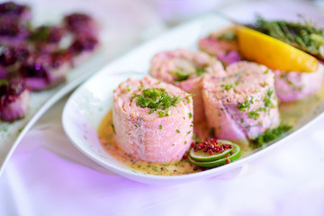 Delicious fish rolls with vegetables served on a party or wedding reception