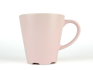 Pink fine porcelain cup on white background