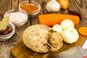 Root celery, onions, carrots for cooking
