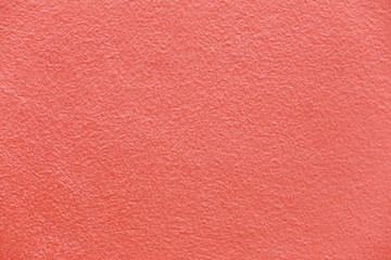surface of red cement wall.