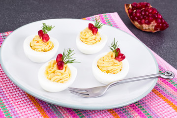 Festive snack stuffed eggs