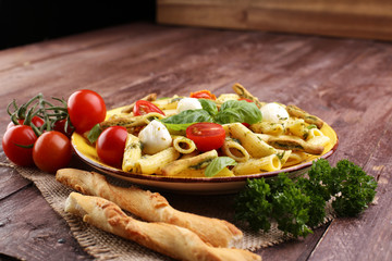 Traditional Italian penne pasta, fresh mozzarella, fresh tomato and sun dried tomato meal