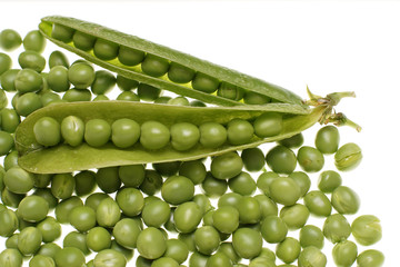 Fresh raw green peas within a pods on white background