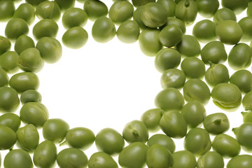 Fresh raw green peas on white background