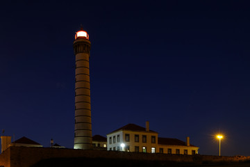 Lighthouse by night - 139501361