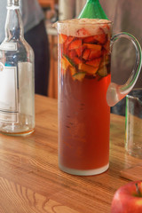 Fresh fruit drink and soda in a glass