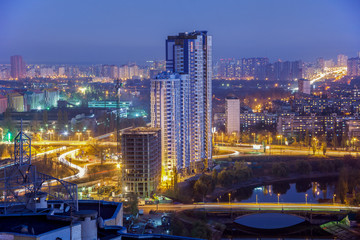 Naklejka na ściany i meble Night Kiev city view, panorama of construction bulding Kiev, rusanovka, Ukraine