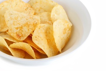 Potato Chips in a White China Bowl on White Background
