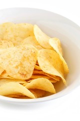 Potato Chips in a White China Bowl on White Background