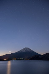 Lake Motosu and mt.Fuji at night time