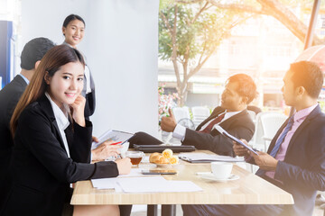 smart beautiful business woman smile with background of business meeting amd presentation