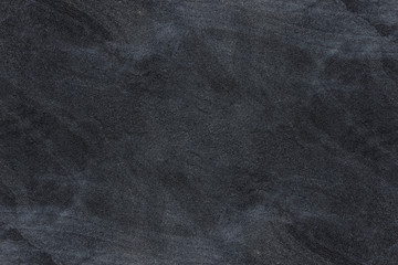 Dark grey black slate background or texture.