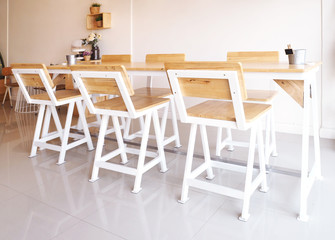 Set of long wooden table and chairs