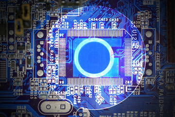 Disk or CD with electronics circuit background.