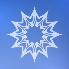 Abstract decorative element on a blue background. Star.