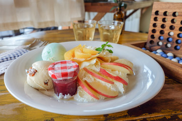 crepe with fresh fruit  on wooden table