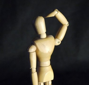 Wooden mannequin saluting