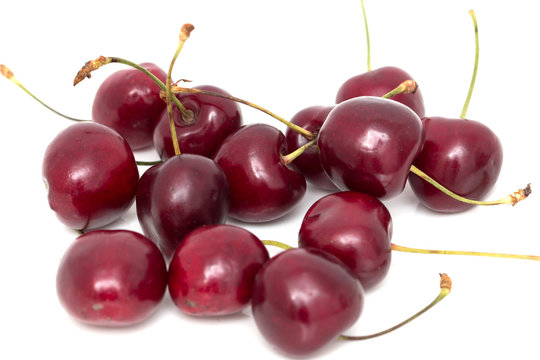 ripe red cherry on a white background