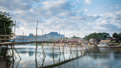 Traditional bridge for crossing to other side of Song river, Vang-Vieng Laos