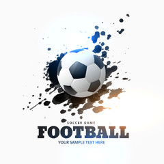 football placed on ink splash background