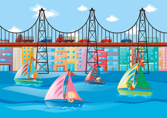 City scene with kids sailing and cars on bridge