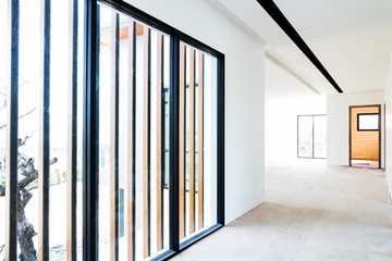 Empty room interior build wall gypsum board white colur and Air conditioner in construction site