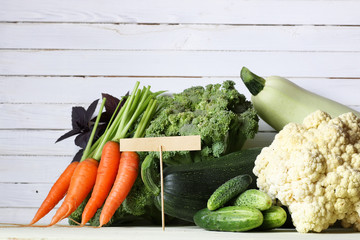Fresh vegetables rustic wooden background