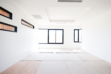 Empty room interior build wall gypsum board white colur and Air conditioner in construction site