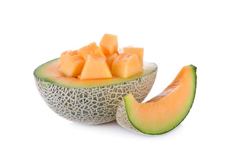 half and portion cut ripe cantaloupe on a white background