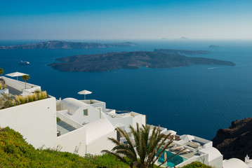 Architecture of  island of Santorini, the most romantic island in the world, Greece. Hotels in Santorini. Walking the streets of Fira summer day, Travel to Greece. Beautiful white exterior Santorini