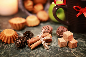 night cup of tea with candle and apple