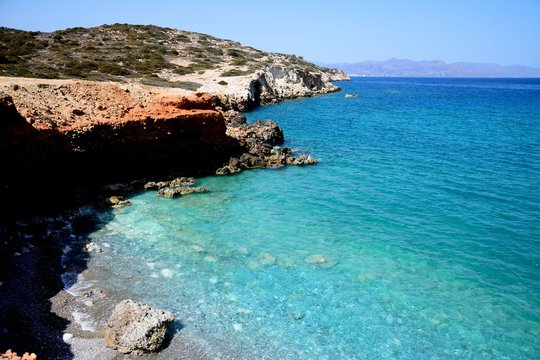 Elevated view of the beach and rugged coastline near Ammoudara, Crete.