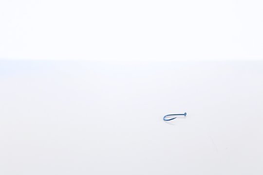 Blue Fishing Hook Isolated on White Background