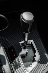 NIZHNY NOVGOROD, RUSSIA - JULY 21, 2013: Auto show. Car gear shift stick
