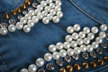 denim with studs, beads, stones background