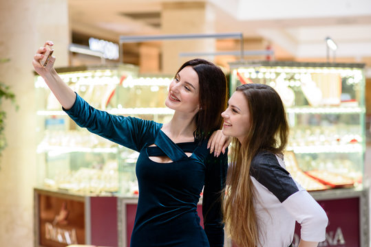 Girls make selfi at the Mall.