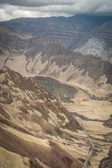 Peruvian Andes canyon and roads passing through it. Moquegua Region, Peru. South America.