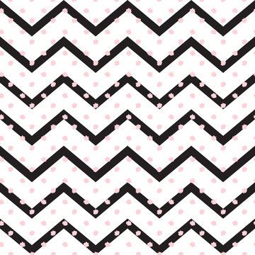 Zigzag geometric seamless pattern with pink polka dots. Black stripes, pink dots pattern. Trendy style fabric print