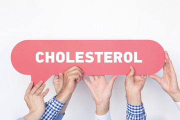 Group of people holding the CHOLESTEROL written speech bubble